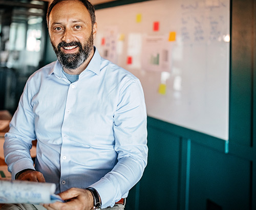Man holding instructor-led courseware
