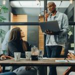 Adaptive leadership in a vuca world featuring a leader interacting with employees