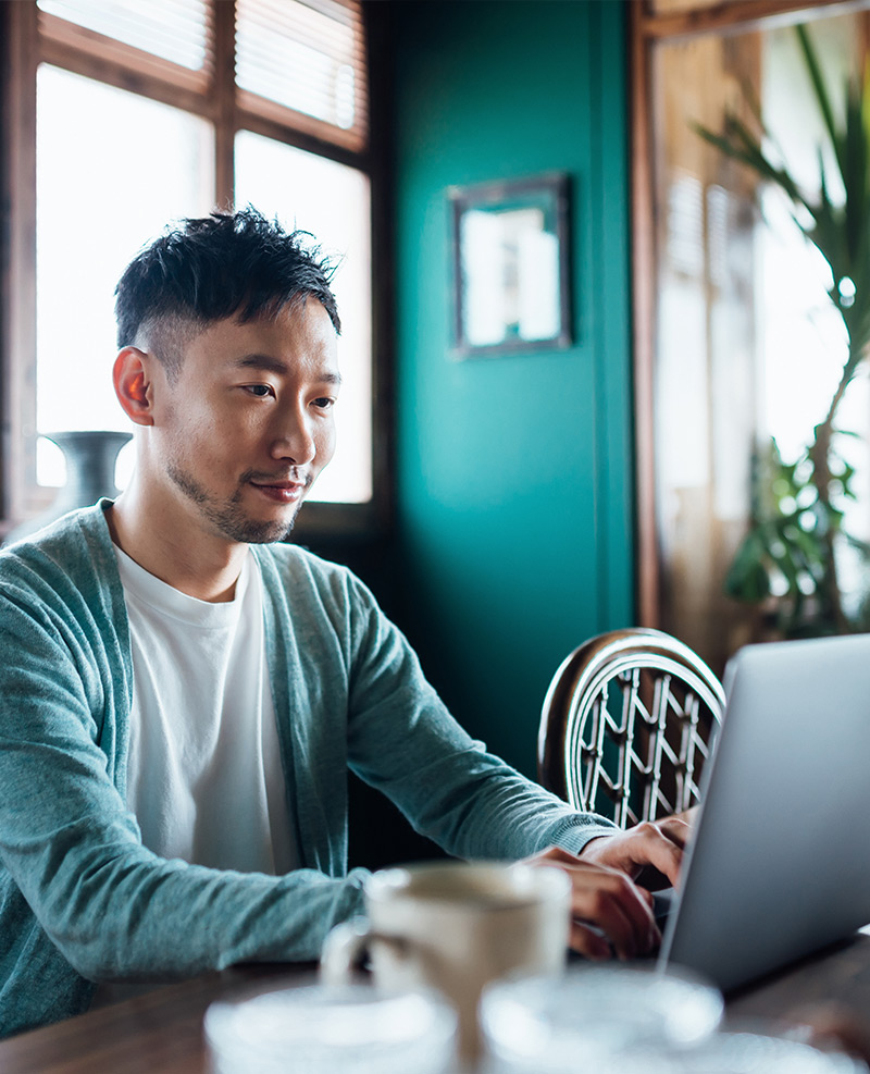 Man using computer to access LMS